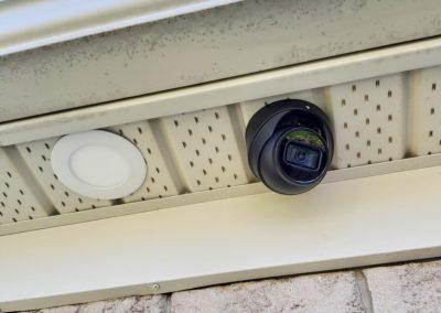 Black IP Turret Security Camera installed on Soffit