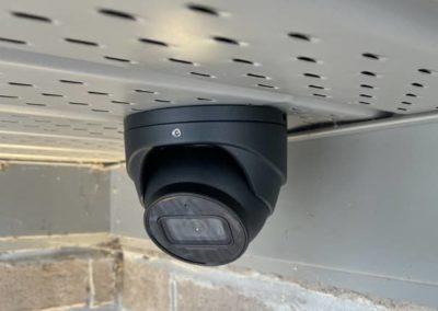 Black Turret IP Security Camera installed on Soffit
