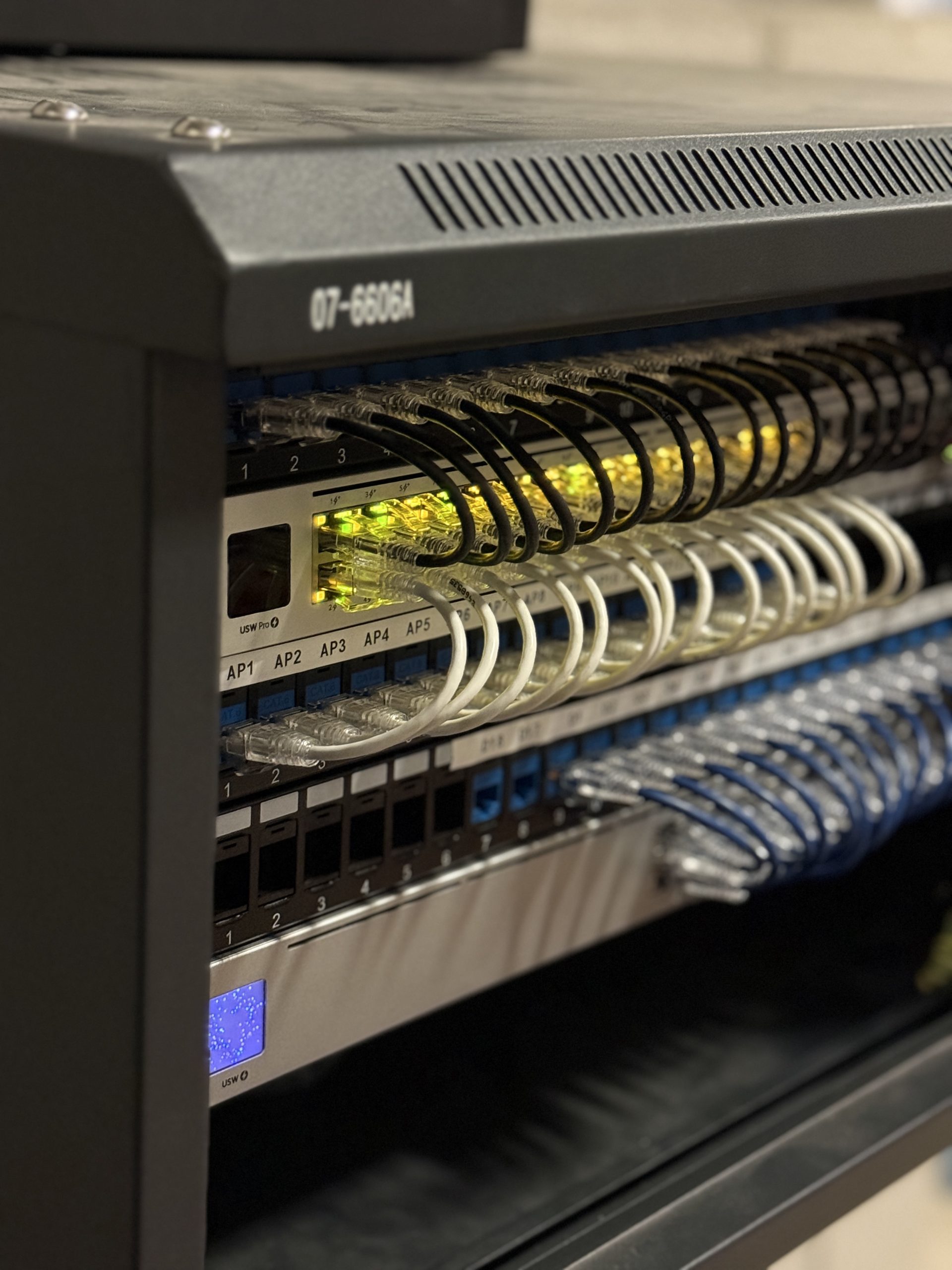 20251223_223713676_iOS 65" Frame TV Installed on stone wall