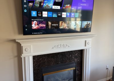 TV Installed Above Fireplace with wires hidden