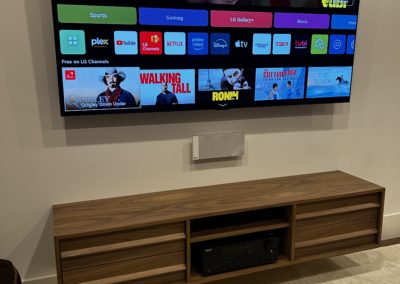 TV and Floating shelf installed with wires hidden in Hamilton